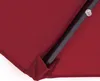 Close-up view of the fabric and support structure of a red umbrella. Produktbild-Vorschau