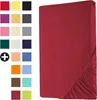 A red fitted sheet is shown folded and displayed on a white background. Produktbild-Vorschau