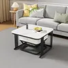 A modern living room scene with a grey sofa and a white marble-look coffee table. Voir les images du produit