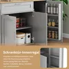 Interior view of a gray kitchen cabinet with shelves and storage containers, and a pull-out spice rack on the door. Náhled obrázku produktu