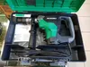 A power tool, specifically a hammer drill, is displayed inside its carrying case. Produktbild-Vorschau