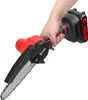 A hand holding a mini chainsaw with a battery pack attached. Produktbild-Vorschau