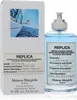 A product shot of a perfume bottle and its box. Voir les images du produit