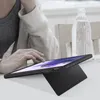 A person's hands are shown interacting with a tablet that is propped up by its cover. Produktbild-Vorschau