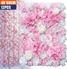 A close-up view of artificial flower wall panels in pink and white. Voir les images du produit