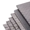 A stack of gray gasket sheets on a white background. Voir les images du produit
