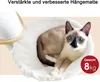 A Siamese cat is resting in a white, fluffy hammock, which is part of a larger cat tree structure. The background is a plain, light beige color. Produktbild-Vorschau