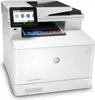 A white HP Color LaserJet Pro MFP M479fnw printer is shown from a front-diagonal angle against a white background. The printer has a touchscreen display showing icons and text, and a document is partially inserted into the paper feeder. Náhled obrázku produktu