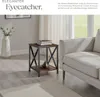 A side table next to a sofa in a living room. Náhled obrázku produktu