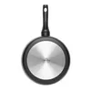 The bottom view of a black frying pan with a silver base and a black handle, set against a white background. Podgląd zdjęcia produktu