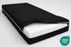 A black mattress with a white foam core is shown with the cover partially removed. Produktbild-Vorschau