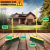 Two brooms are displayed on a wooden deck in front of a house. Produktbild-Vorschau