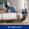 A person is using a cordless vacuum cleaner to clean under a sofa. Produktbild-Vorschau