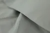 A close-up shot of gray fabric, showing its texture and weave. Produktbild-Vorschau
