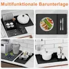 A collage of four images showing a black silicone mat used in various kitchen scenarios, such as drying dishes, serving food, holding coffee cups, and placing hot pots. Produktbild-Vorschau