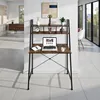 A modern desk with a laptop and accessories in a home office setting. Produktbild-Vorschau