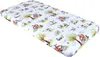 A baby crib sheet with a pattern of foxes riding bicycles in a forest setting. Produktbild-Vorschau