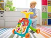 A young boy is playing with a multi-functional baby walker in a brightly colored playroom. Náhľad obrázku produktu