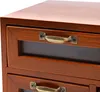 Close-up view of a wooden storage unit with drawers. Podgląd zdjęcia produktu