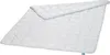 A white quilted blanket is laid out on a white background. Produktbild-Vorschau