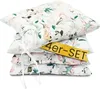 A stack of four floral-patterned seat cushions tied together with a white ribbon. Produktbild-Vorschau