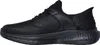 A side view of a black Skechers slip-on shoe. Produktbild-Vorschau