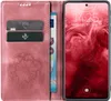 A pink flip phone case with a dandelion design is shown open, revealing card slots and a banknote. A smartphone is displayed within the case. Produktbild-Vorschau
