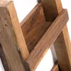 Close-up view of a wooden shelf or ladder. Náhled obrázku produktu