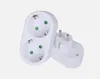 A white electrical adapter with two sockets and a plug. Produktbild-Vorschau
