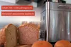 Ein aufgeschnittenes Brot liegt neben dem Brotbackautomaten Unold Backmeister® Edel auf einer Küchen Produktbild-Vorschau