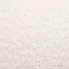 A close-up texture shot of a fluffy, ivory-colored fabric. Náhled obrázku produktu