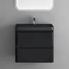 A black vanity with a sink and faucet against a gray wall, under a lighted mirror. Anteprima dell’immagine prodotto