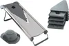 A kitchen mandoline slicer with accessories on a white background. Produktbild-Vorschau