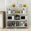 A multi-tiered metal shelving unit filled with various kitchen appliances and containers. Voir les images du produit