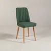 A green upholstered chair with wooden legs is shown against a plain white background. Produktbild-Vorschau