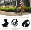 A woman pushing a stroller with a baby on a wooden walkway next to a building and greenery. Below are close-up images of stroller features. Produktbild-Vorschau