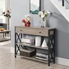 A console table with decorative items and books in a hallway setting. Produktbild-Vorschau