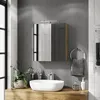 A modern bathroom vanity with a sink, mirror, and cabinet. Produktbild-Vorschau