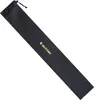A black storage bag with a gold logo, lying diagonally on a white background. Produktbild-Vorschau