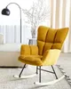 A yellow rocking chair is placed in a living room setting with a floor lamp and curtains in the background. Náhled obrázku produktu