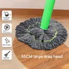A mop head with a green handle is shown on a wooden floor, with feature icons and text overlays. Voir les images du produit