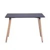 A black rectangular table with four wooden legs, shown from the front against a white background. Náhled obrázku produktu