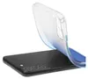A clear phone case with a blue gradient is shown being placed onto a black smartphone. Produktbild-Vorschau