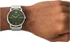 A close-up shot of a man's wrist wearing an Emporio Armani watch. Náhled obrázku produktu