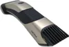 A close-up, studio shot of a Philips body groomer on a white background. Podgląd zdjęcia produktu