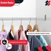 A white closet rod with clothes hanging on wooden hangers. Anteprima dell’immagine prodotto