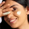 A close-up shot of a woman's face with skincare products applied. Anteprima dell’immagine prodotto