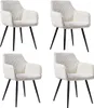 Four beige dining chairs with black legs are arranged in a grid against a white background. Náhled obrázku produktu