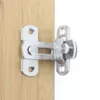 A stainless steel latch is mounted on a wooden surface. Produktbild-Vorschau