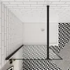 A top-down view of a modern shower enclosure with patterned tiles. Produktbild-Vorschau